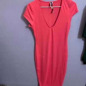 A long, fuchsia, large(fits small/medium best)dress for women.